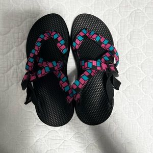 Pink and blue backless Chacos
